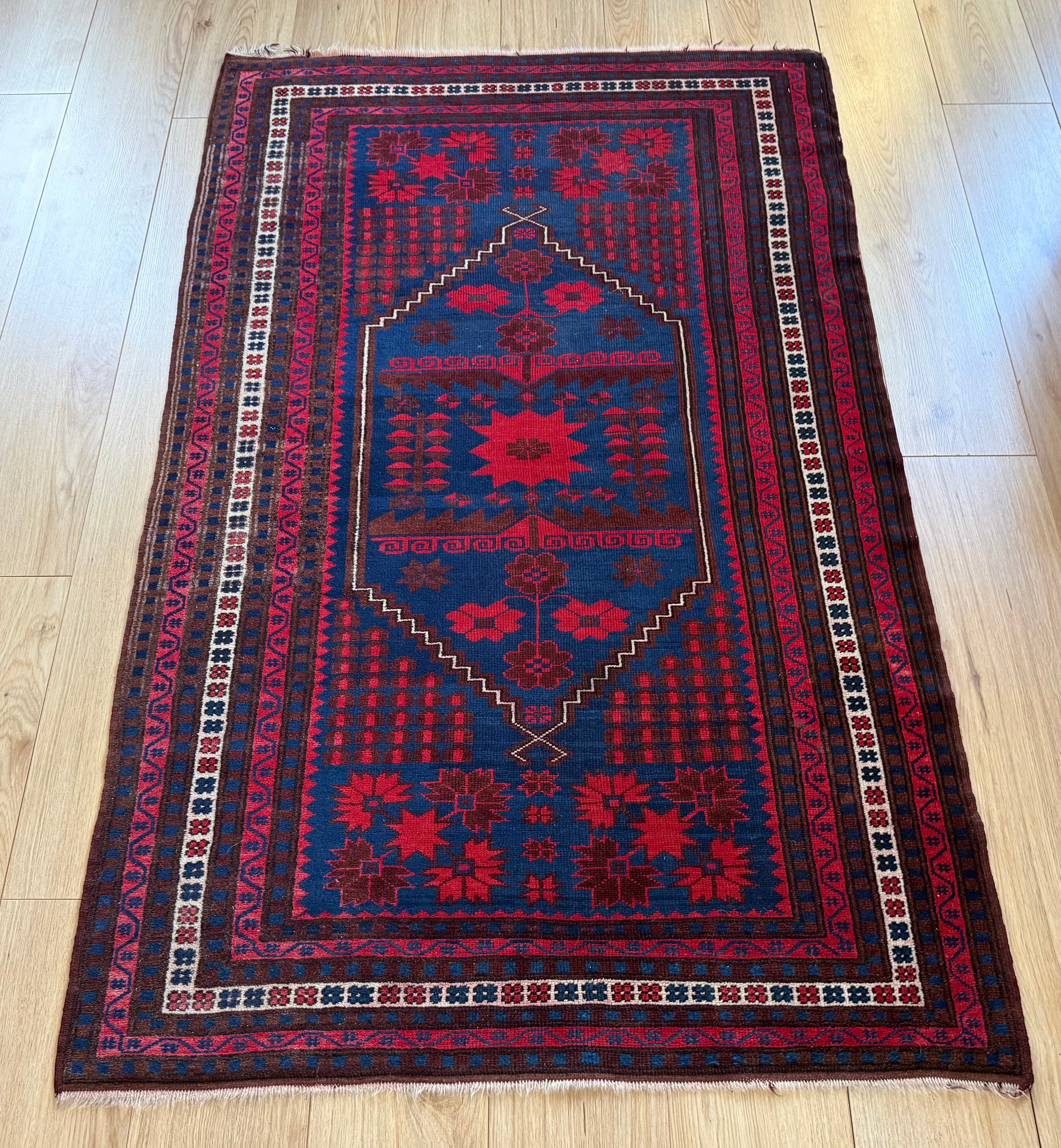 Hand-knotted tribal vintage carpet – Baluch – Indigo & star medallion – ca. 1920–1935 size: 177 × 108 cm