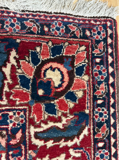 Vintage handgeknoopt tapijt 320 × 220 cm – klassiek rood met ivoor en donkerblauw