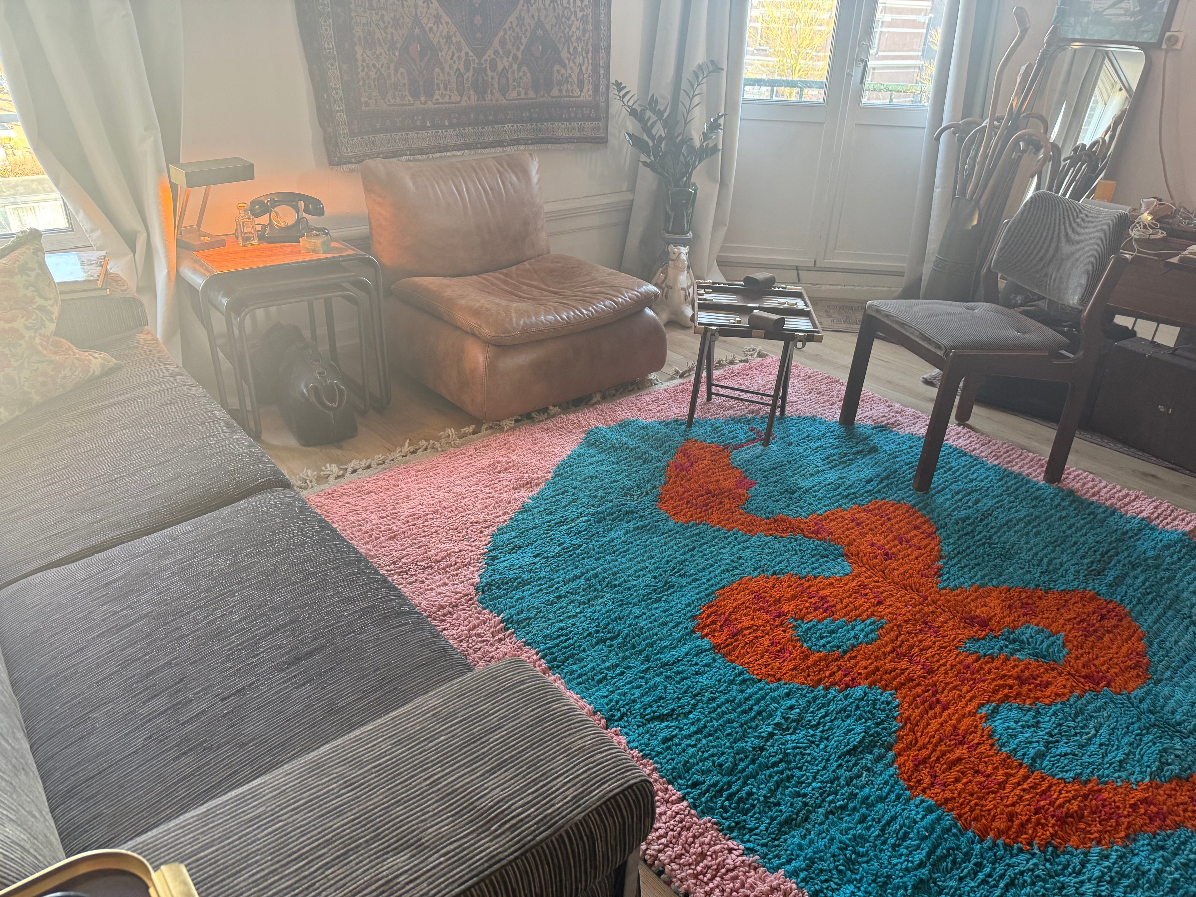 Handmade high-pile wool carpet with snake motif – 325 × 204 cm