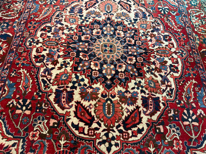 Vintage handgeknoopt tapijt 320 × 220 cm – klassiek rood met ivoor en donkerblauw