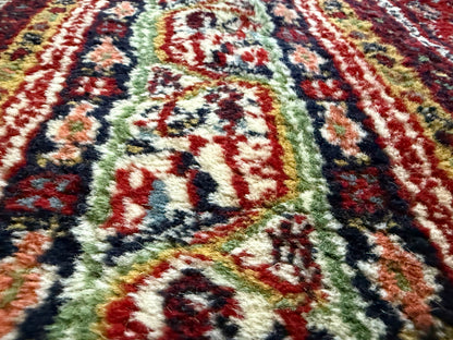 Dieprood handgeknoopt tapijt met boteh-motief – ca. 296 × 197 cm