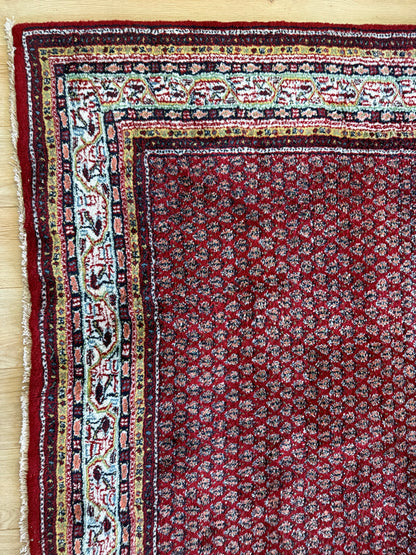 Dieprood handgeknoopt tapijt met boteh-motief – ca. 296 × 197 cm