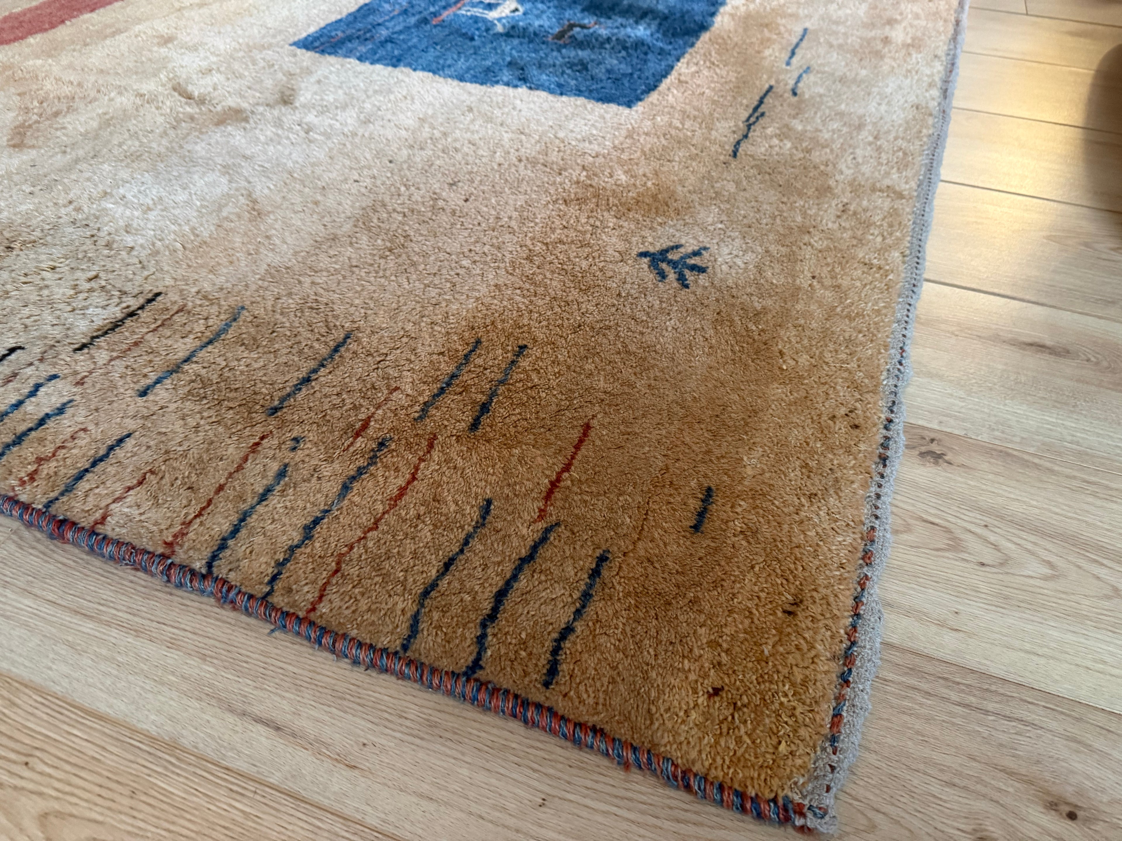 Hand-knotted wool carpet with nomadic pattern – 283 × 215 cm