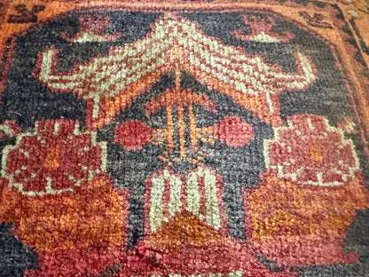 Vintage nomadic floor cushion made of hand-knotted wool, one of a kind