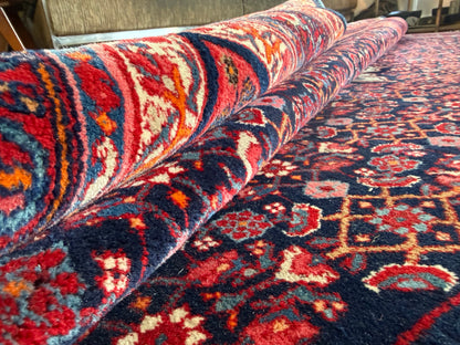 Groot handgeknoopt vintage tapijt – donkerblauw veld met medaillon – 305 × 209 cm