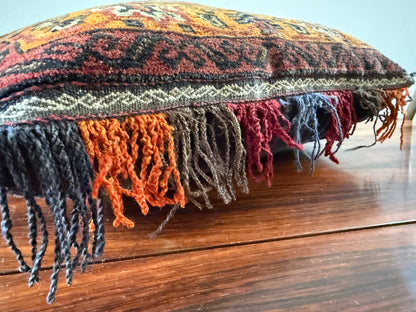 Vintage nomadic floor cushion made of hand-knotted wool, one of a kind