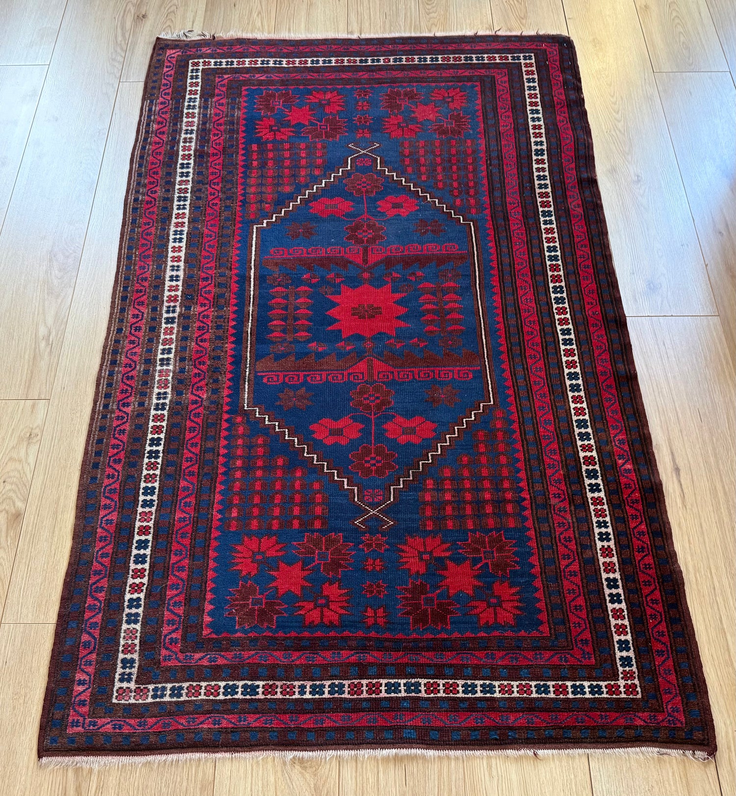Hand-knotted tribal vintage carpet – Baluch – Indigo &amp; star medallion – ca. 1920–1935 size: 177 × 108 cm