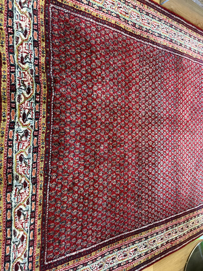 Dieprood handgeknoopt tapijt met boteh-motief – ca. 296 × 197 cm