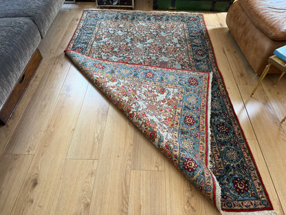 Hand-knotted vintage carpet in Ghom style – 212 × 138 cm