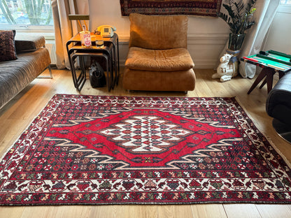 Vintage handgeknoopt tapijt met grafisch medaillon – 209 × 134 cm