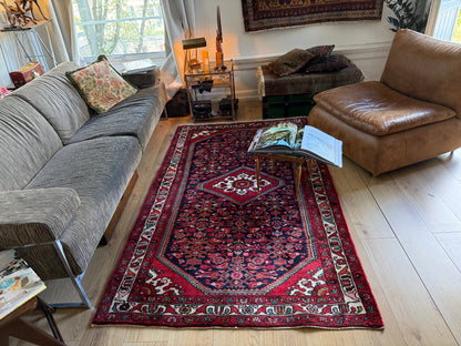 Vintage handgeknoopt wollen tapijt met medaillon – rood en donkerblauw – 217 × 130 cm