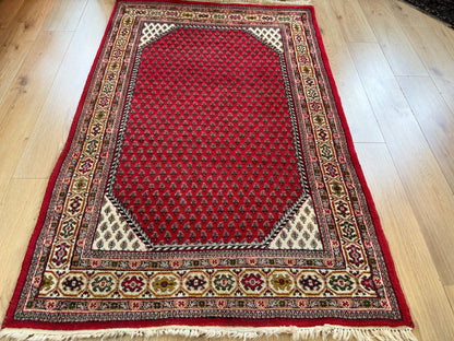 Vintage handgeknoopt vloerkleed – klassiek boteh design – ca. 192 × 125 cm