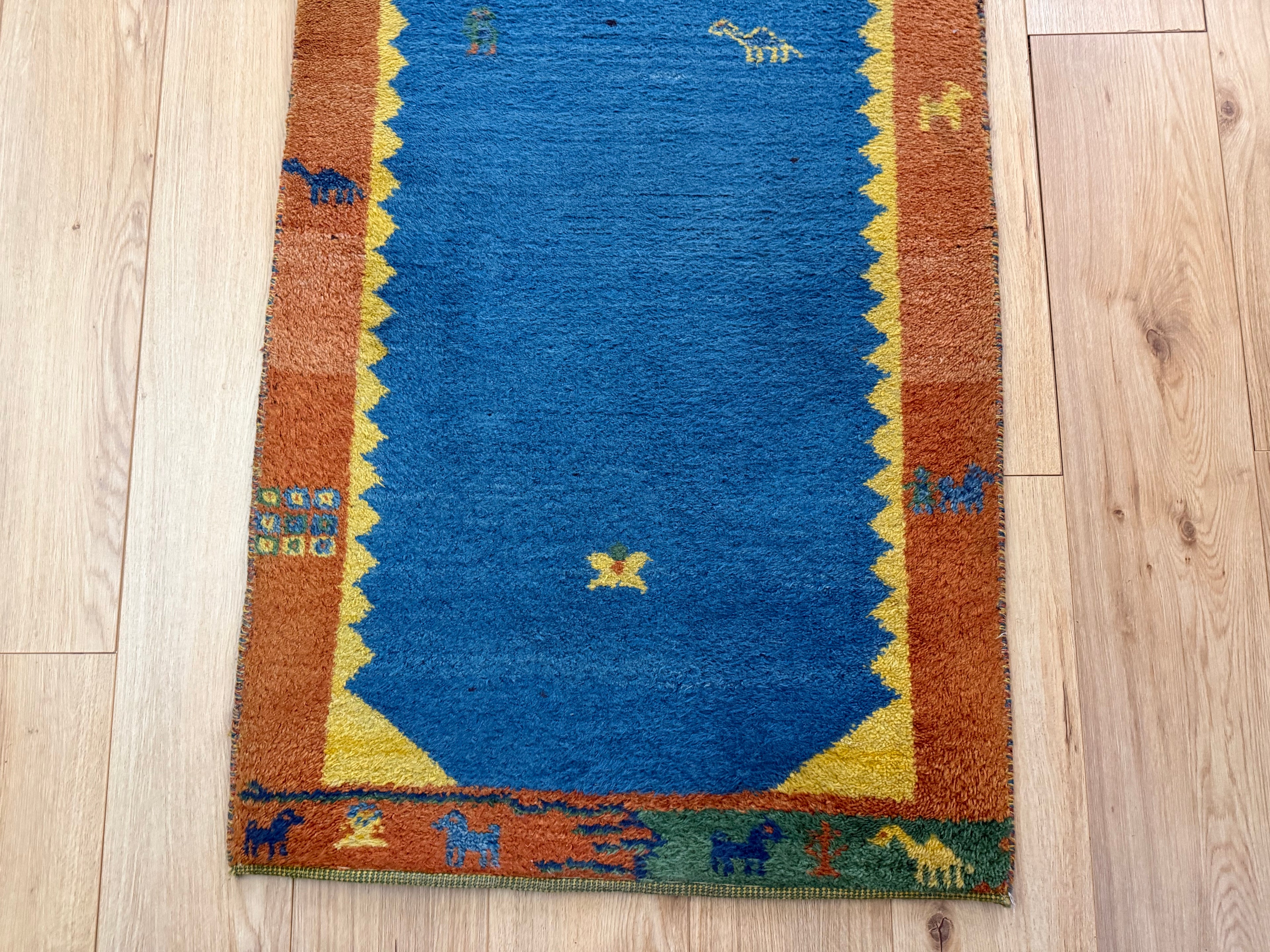 Vintage handgeknoopte loper – blauw &amp; oker – ca. 302 × 77,5 cm