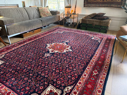 Groot handgeknoopt vintage tapijt – donkerblauw veld met medaillon – 305 × 209 cm